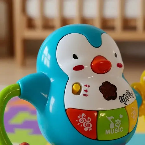Sonajero Musical Bebé Diseño Mamá Pingüino Agua · 18104 · foto 05