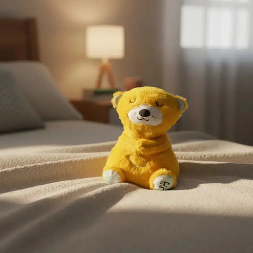 Peluche de Apego Nutria con Luz Sonido y Respiración Bebé Amarillo 25cm · 16777 · foto 03
